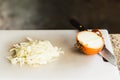 Chopped onions on cutting board