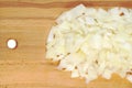 Chopped onions on a wooden board Royalty Free Stock Photo