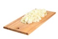 Chopped onions on a wooden board Royalty Free Stock Photo