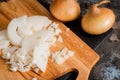 Chopped onions on wooden cutting board Royalty Free Stock Photo