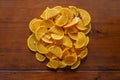 Chopped orange on a wooden table. Royalty Free Stock Photo