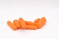 Peeled Baby Carrots on White Background Royalty Free Stock Photo