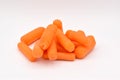 Peeled Baby Carrots on White Background Royalty Free Stock Photo