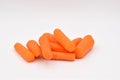 Peeled Baby Carrots on White Background Royalty Free Stock Photo