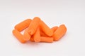 Peeled Baby Carrots on White Background Royalty Free Stock Photo