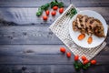 A large piece of baked meat Still life on a light wooden table Royalty Free Stock Photo