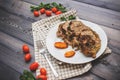 A large piece of baked meat Still life on a light wooden table Royalty Free Stock Photo