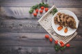 A large piece of baked meat Still life on a light wooden table Royalty Free Stock Photo