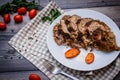 A large piece of baked meat Still life on a light wooden table Royalty Free Stock Photo