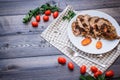 A large piece of baked meat Still life on a light wooden table Royalty Free Stock Photo