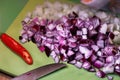 Chopped Purple and white onions on cutting board. Royalty Free Stock Photo