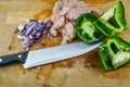 Chopped raw chicken meat, red onions and green peppers Royalty Free Stock Photo