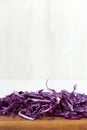 Chopped red cabbage on cutting board, closeup. Royalty Free Stock Photo