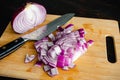 Chopped Red Onion on a Bamboo Cutting Board Royalty Free Stock Photo