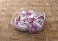 Chopped red onions in a plastic container Royalty Free Stock Photo