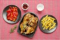 Chopped roast chicken garnished with French fries, with fesco rosemary, dehydrated callenas Royalty Free Stock Photo