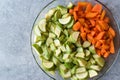 Chopped Zucchini and Carrot Slices in Glass Bowl. Royalty Free Stock Photo