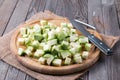 Chopped zucchini on wooden board Royalty Free Stock Photo