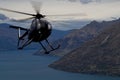 Chopper action over Queenstown Royalty Free Stock Photo
