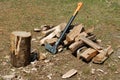 Chopping block, ax, and split wood