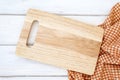 A chopping board and tablecloth on white table , recipes food  for healthy habits shot note background concept Royalty Free Stock Photo