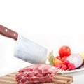 Chopping fresh pork ribs and vegetables Royalty Free Stock Photo