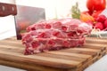 Chopping fresh pork ribs and vegetables Royalty Free Stock Photo