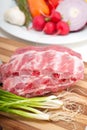 Chopping fresh pork ribs and vegetables Royalty Free Stock Photo