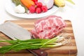 Chopping fresh pork ribs and vegetables Royalty Free Stock Photo