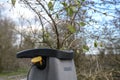Chopping old branches and pruning waste with an electric garden shredder Royalty Free Stock Photo