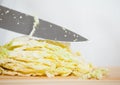 Chopping savoy cabbage Royalty Free Stock Photo