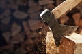 Chopping wood with axe - closeup on flying wooden chips - copy s Royalty Free Stock Photo