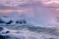 Choppy seas and breaking waves at sunset Royalty Free Stock Photo