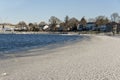 Choppy water making waves in Fairhaven shoreline ice Royalty Free Stock Photo