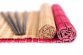 Chopsticks and bamboo mats for asian food Royalty Free Stock Photo