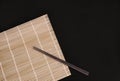 Chopsticks on bamboo matt Royalty Free Stock Photo