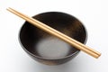 Chopsticks and black bowl Royalty Free Stock Photo