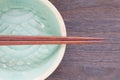 Chopsticks and celadon green ceramic Royalty Free Stock Photo