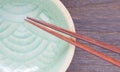 Chopsticks and celadon green ceramic Royalty Free Stock Photo