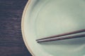 Chopsticks and celadon green ceramic Royalty Free Stock Photo