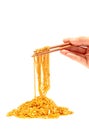 Chopsticks with goiden chains isolated Royalty Free Stock Photo