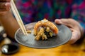 Chopsticks hold on sushi fresh salmon. Japanese food for healthy. salmon sushi, egg salmon sushi premium menu. Royalty Free Stock Photo