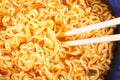 Chopsticks in noodle broth