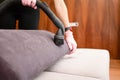Chore home concept, woman`s hand gesture using a vacuum cleaner.