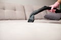 Chore home concept, woman`s hand gesture using a vacuum cleaner. Royalty Free Stock Photo