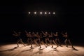 A choreographed dance of a group of graceful pretty young ballerinas practicing on stage in a classical ballet school. Royalty Free Stock Photo