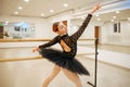 Choreographer poses at the barre, ballet school Royalty Free Stock Photo
