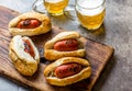 Choripan. Latin American Argentine and chilean food. Grilled chorizo sausages hot dogs served with beer, top view, stone Royalty Free Stock Photo