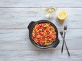 Chorizo orzo salad with roasted pepper. Top view.