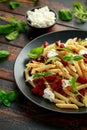Chorizo, Penne pasta with creamy ricotta cheese and greens Royalty Free Stock Photo
